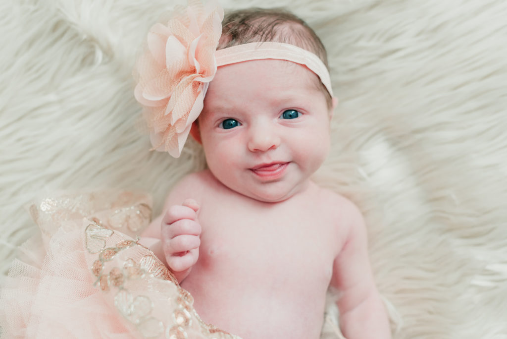 Baby girl with pink bow