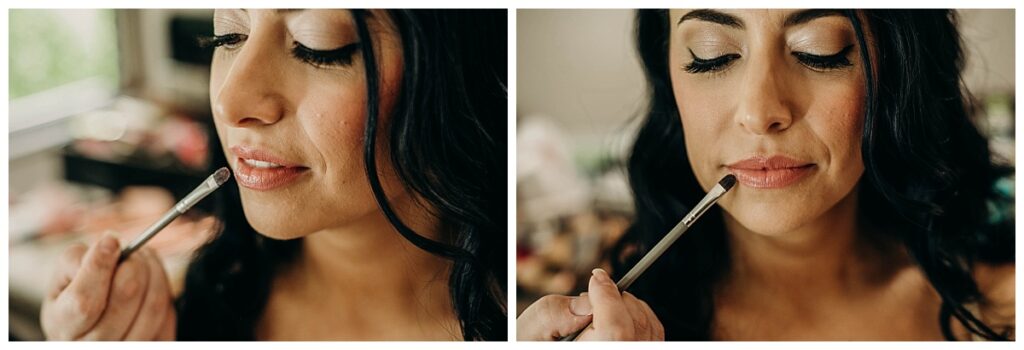 Bride getting the final touches of her makeup finished 