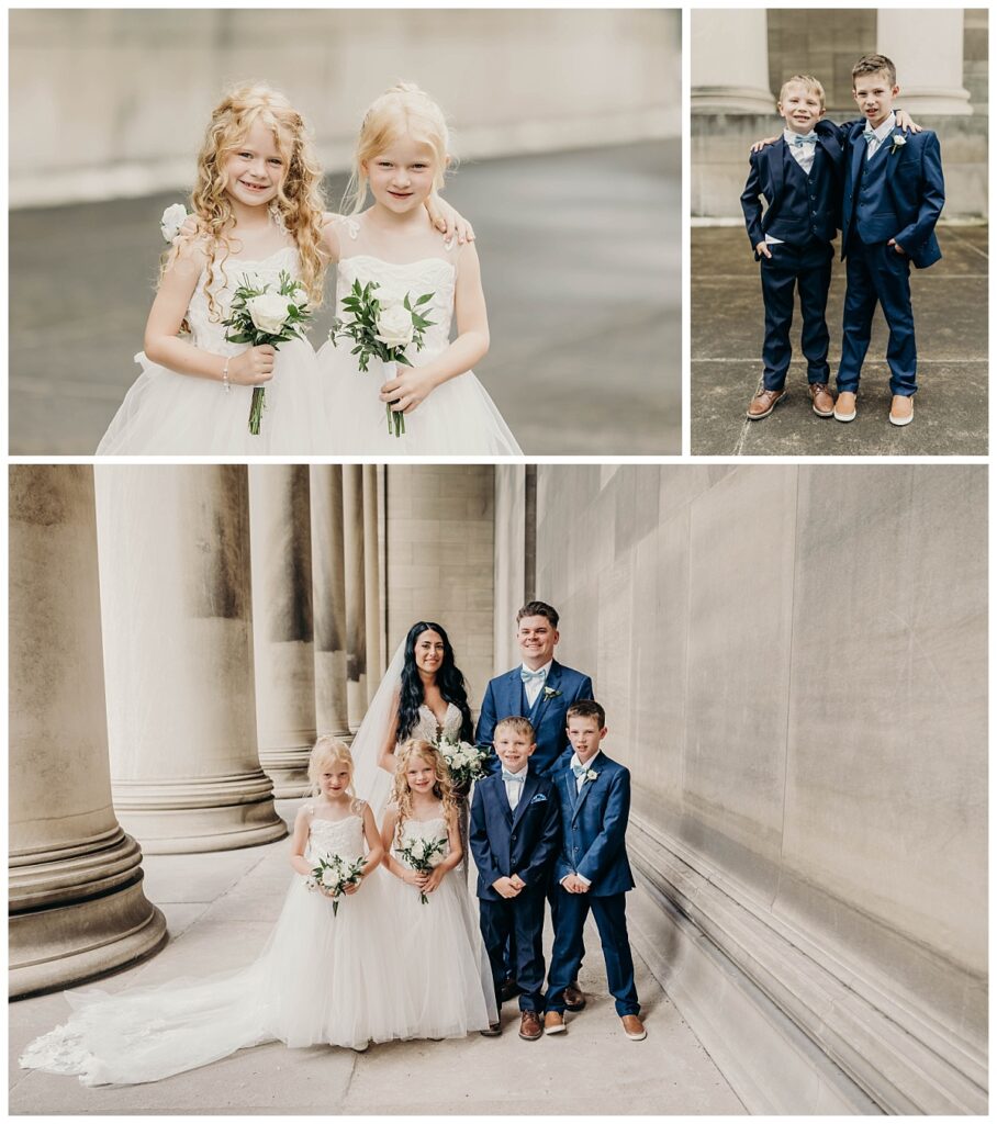 Flower girl and ring bearers posing together, dressed in their wedding attire, with the Mellon Institute’s elegant backdrop.