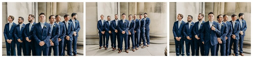 Groom and groomsmen posing in formal attire at the Mellon Institute, highlighting their coordinated suits and the venue’s classic architecture.